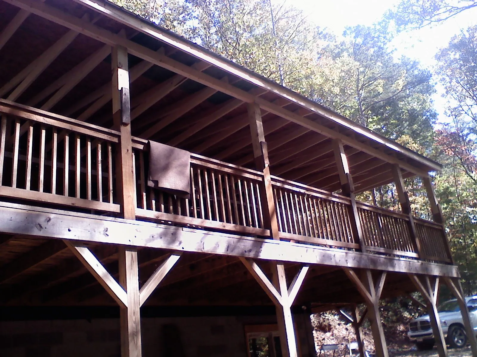 Timber framing under a new elevated porch and deck in Pine Ridge